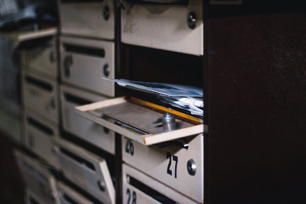 A close up of an open drawer with papers